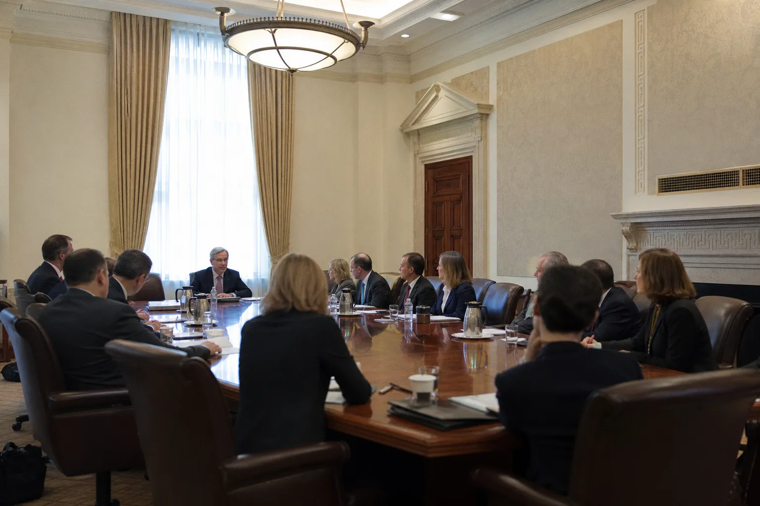 Fed officials fret over inflation risk, weigh rate hikes